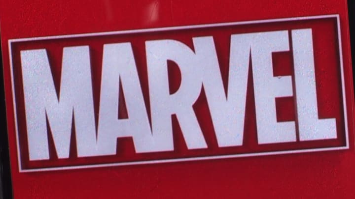 In this photo illustration, Marvel Entertainment logo seen...
