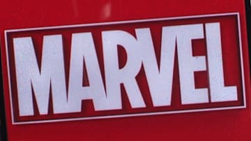 In this photo illustration, Marvel Entertainment logo seen...