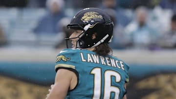 Dec 7, 2025; Jacksonville, Florida, USA;  Jacksonville Jaguars quarterback Trevor Lawrence (16) looks downfield against the Indianapolis Colts during the second half at EverBank Stadium. Mandatory Credit: Travis Register-Imagn Images