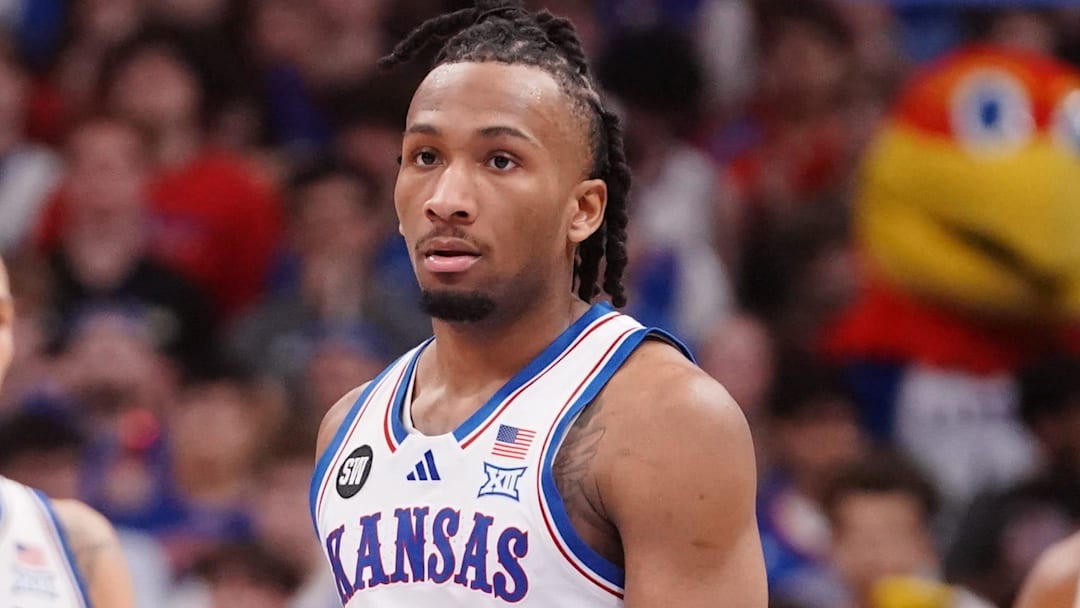 Kansas Jayhawks guard Darryn Peterson (22) enters the court with Kansas Jayhawks guard Tre White (3) and Kansas Jayhawks forward Bryson Tiller (15) during the game against Houston Cougars inside Allen Fieldhouse on Monday, Feb. 23, 2026.
