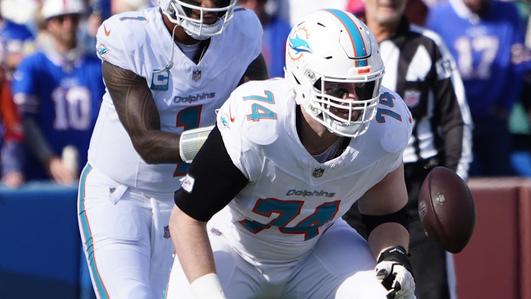 Miami Dolphins offensive lineman Liam Eichenberg prepares to block against the Buffalo Bills during the first half at Highmark Stadium in a 2024 game.