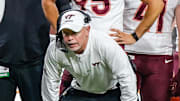 Sep 27, 2025; Raleigh, North Carolina, USA; Virginia Tech Hokies interim head coach Philip Montgomery shouts to his team during the first half of the game against North Carolina State Wolfpack at Carter-Finley Stadium. Mandatory Credit: Jaylynn Nash-Imagn Images