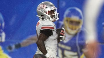 UNLV Rebels running back Jai'Den Thomas (9) runs for a touchdown against the San Jose State Spartans during the third quarter at CEFCU Stadium. Mandatory Credit: D. Ross Cameron-Imagn Images