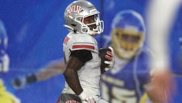 UNLV Rebels running back Jai'Den Thomas (9) runs for a touchdown against the San Jose State Spartans during the third quarter at CEFCU Stadium. Mandatory Credit: D. Ross Cameron-Imagn Images
