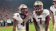 Nov 8, 2025; Clemson, South Carolina, USA; Florida State Seminoles receiver Lawayne McCoy (7) celebrates with teammates after scoring against the Clemson Tigers during the second quarter at Memorial Stadium. Mandatory Credit: Ken Ruinard - GREENVILLE NEWS-USA TODAY Network via Imagn Images