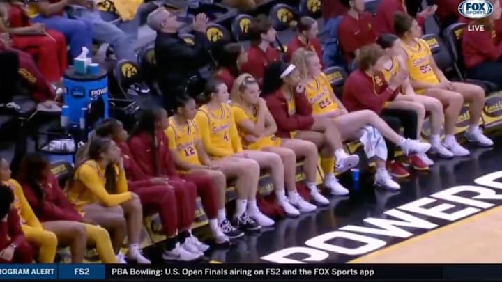 The USC Trojans watch Caitlin Clark’s jersey retirement ceremony.