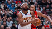 Oct 6, 2025; Vancouver, British Columbia, CAN; Denver Nuggets guard Bruce Brown (11) looks for a lay up against the Toronto Raptors in the second half at Rogers Arena. Mandatory Credit: Bob Frid-Imagn Images