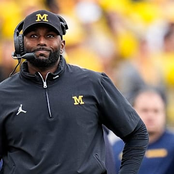 Michigan head coach Sherrone Moore reacts after scoring a field goal against Texas during the second half at Michigan Stadium in Ann Arbor on Saturday, September 7, 2024.