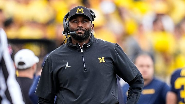 Michigan head coach Sherrone Moore reacts after scoring a field goal against Texas during the second half at Michigan Stadium in Ann Arbor on Saturday, September 7, 2024.