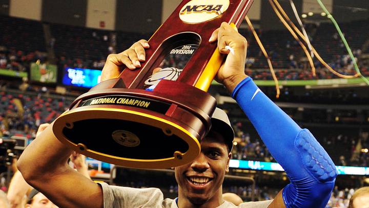 Apr 2, 2012; New Orleans, LA, USA; Kentucky Wildcats forward Terrence Jones hoists the NCAA trophy as he walks off the court after the finals of the 2012 NCAA men's basketball Final Four against the Kansas Jayhawks at the Mercedes-Benz Superdome. Kentucky won 67-59. Mandatory Credit: Bob Donnan-Imagn Images
