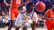 Feb 17, 2024; Atlanta, Georgia, USA; Georgia Tech Yellow Jackets forward Baye Ndongo (11) reaches for the ball against the Syracuse Orange in the second half at McCamish Pavilion. Mandatory Credit: Brett Davis-Imagn Images
