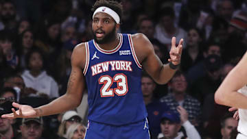 Dec 4, 2021; New York, New York, USA; New York Knicks center Mitchell Robinson (23) reacts after being called for a foul in the third quarter against the Denver Nuggets at Madison Square Garden. Mandatory Credit: Wendell Cruz-Imagn Images