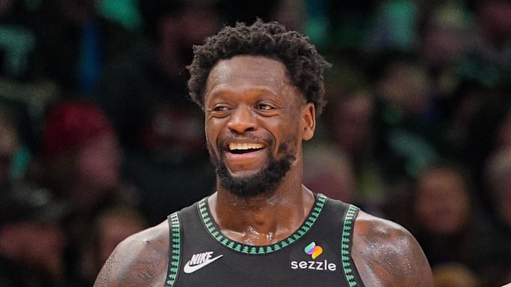 Feb 9, 2026; Minneapolis, Minnesota, USA; Minnesota Timberwolves forward Julius Randle (30) and guard Anthony Edwards (5) laugh after a timeout against the Atlanta Hawks in the fourth quarter at Target Center. Mandatory Credit: Brad Rempel-Imagn Images