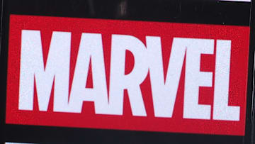 In this photo illustration, Marvel Entertainment logo seen...
