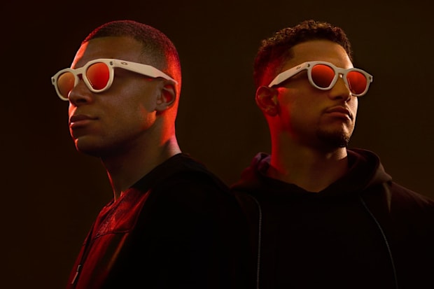Kylian Mbappé and Patrick Mahomes model sunglasses.