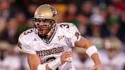 Nov. 13, 2004; South Bend, IN USA; Pittsburgh quarterback Tyler Palko runs the ball during Pittsburgh's 41-38 win over Notre Dame at Notre Dame Stadium. Mandatory Credit: Photo By Matt Cashore-Imagn Images Copyright (c) 2004 Matt Cashore