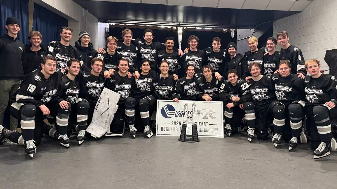 Providence players pose after winning the 2025-26 Hockey East regular season championship. 