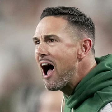 Green Bay Packers coach Matt LaFleur argues for a penalty against the Washington Commanders.