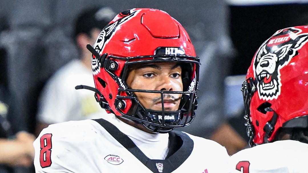 Sep 11, 2025; Winston-Salem, North Carolina, USA;  North Carolina State Wolfpack wide receiver Terrell Anderson (9) celebrates a touchdown with North Carolina State Wolfpack running back Hollywood Smothers (3) against Wake Forest Demon Deacons at Allegacy Federal Credit Union Stadium. Mandatory Credit: Luke Jamroz-Imagn Images