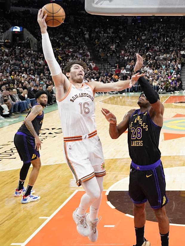 San Antonio Spurs forward Cedi Osman (16) shoots over Los Angeles Lakers forward Rui Hachimura (28) during the second half.