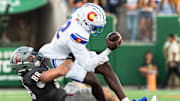Colorado State's Tahj Bullock gets wrapped up during the State pride game against Washington State at Canvas Stadium in Fort Collins, Colo., on Sept. 27, 2025.