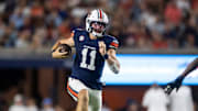Auburn Tigers quarterback Jackson Arnold and head coach Hugh Freeze appear to have a chemistry Freeze lacked with previous quarterbacks. 