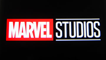 In this photo illustration a Marvel Studios logo is seen on...