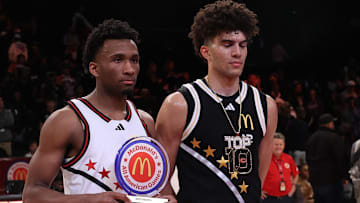 Apr 1, 2025; Brooklyn, NY, USA; McDonald's All American West guard Darryn Peterson (22) and McDonald's All American East forward Cameron Boozer (12) pose for photos after the game at Barclays Center. Mandatory Credit: Pamela Smith-Imagn Images