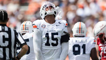 Auburn Tigers defensive end Keldric Faulk (15) celebrates a stop as Auburn Tigers take on South Alabama Jaguars at Jordan-Hare Stadium in Auburn, Ala. on Saturday, Sept. 13, 2025. Auburn Tigers lead South Alabama Jaguars 28-9 at halftime.