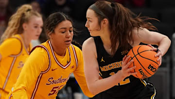 Mar 8, 2025; Indianapolis, IN, USA; South California Trojans guard Talia von Oelhoffen (55) defends against Michigan Wolverines guard Syla Swords (12) during the second half of the Big Ten Conference Tournament semifinals at Gainbridge Fieldhouse. Mandatory Credit: Stephanie Amador Blondet-Imagn Images