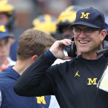 Michigan head coach Jim Harbaugh smiles on the sideline during the second half against Maryland, Saturday, Oct. 6, 2018 at Michigan Stadium.