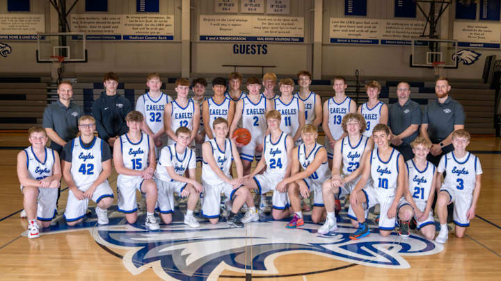 Once an Eagle, always an Eagle. Coach Blank (top left) keeps his school pride close to his heart and hoops. 