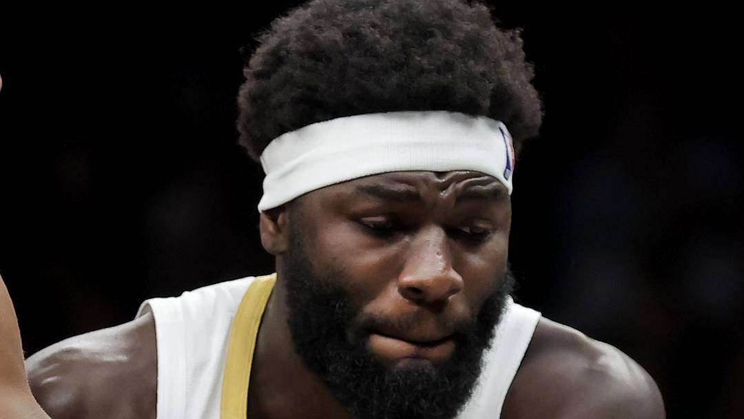Jan 23, 2026; Brooklyn, New York, USA; Brooklyn Nets forward Noah Clowney (21) and Boston Celtics center Neemias Queta (88) fight for the ball during the second quarter at Barclays Center. Mandatory Credit: Brad Penner-Imagn Images