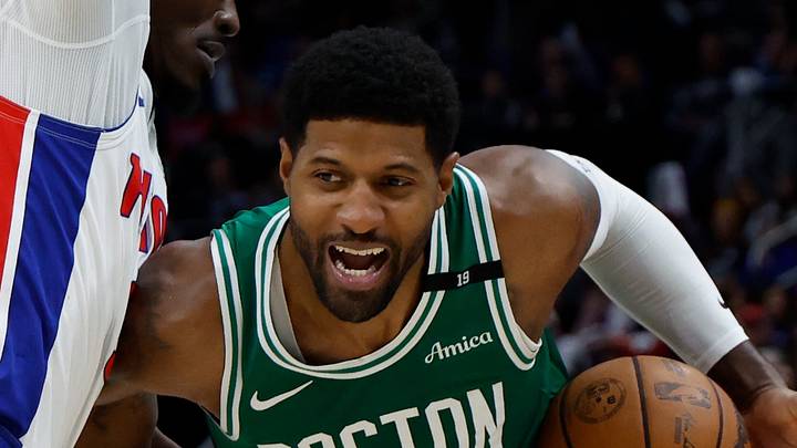Oct 20, 2026; Detroit, Michigan, USA;  Boston Celtics forward Paul George (13) dribbles defended by Detroit Pistons guard Javonte Green (31) in the second half at Little Caesars Arena.  Mandatory Credit: Rick Osentoski-Imagn Images