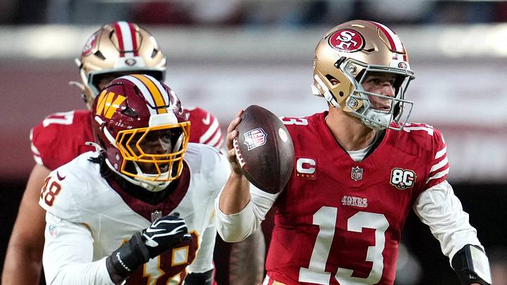 San Francisco 49ers quarterback Brock Purdy (13) under pressure from Washington Commanders linebacker Joshua Josephs (48)