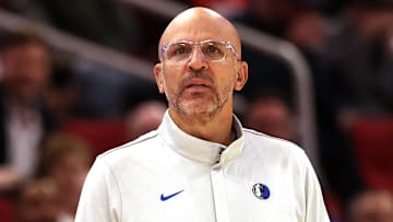 Nov 3, 2025; Houston, Texas, USA; Dallas Mavericks head coach Jason Kidd and forward Dwight Powell (7) watch play against the Houston Rockets  the second quarter at Toyota Center. Mandatory Credit: Thomas Shea-Imagn Images