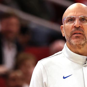 Nov 3, 2025; Houston, Texas, USA; Dallas Mavericks head coach Jason Kidd and forward Dwight Powell (7) watch play against the Houston Rockets  the second quarter at Toyota Center. Mandatory Credit: Thomas Shea-Imagn Images