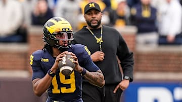 Michigan head coach Sherrone Moore watches quarterback Bryce Underwood (19) during the first half of the spring game at Michigan Stadium in Ann Arbor on Saturday, April 19, 2025.