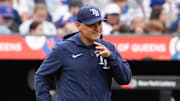 Jun 15, 2025; New York City, New York, USA; Tampa Bay Rays manager Kevin Cash (16) walks to the mound to make a pitching change during the seventh inning against the New York Mets at Citi Field. 
