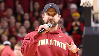 Dec 11, 2025; Ames, Iowa, USA;  Iowa State Cyclones new football coach Jimmy Rogers speaks during the Cyclones game with the Iowa Hawkeyes during the first half at James H. Hilton Coliseum. 
