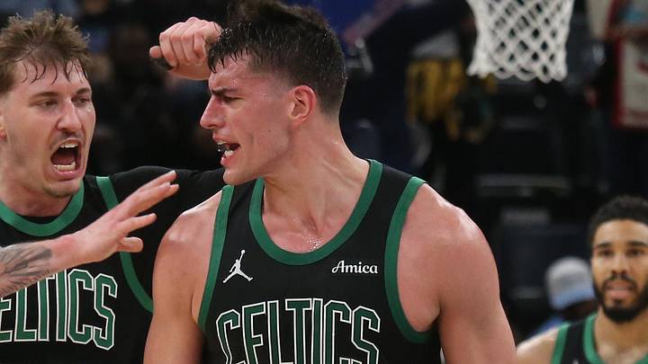 Mar 20, 2026; Memphis, Tennessee, USA; Boston Celtics guard Baylor Scheierman (55) and center Luka Garza (52) react during the fourth quarter against the Memphis Grizzlies at FedExForum. Mandatory Credit: Petre Thomas-Imagn Images