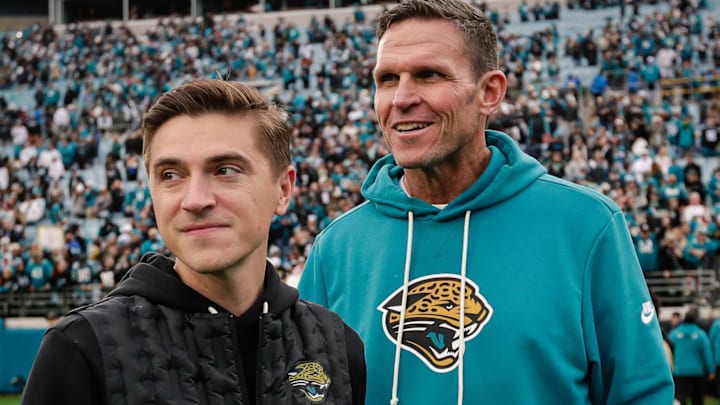 Jan 4, 2026; Jacksonville, Florida, USA; Jacksonville Jaguars executive vice president of football operations Tony Boselli and general manager James Gladstone look on after the game against the Tennessee Titans at EverBank Stadium. 