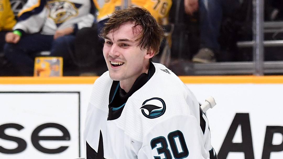 Mar 19, 2024; Nashville, Tennessee, USA; San Jose Sharks goaltender Magnus Chrona (30) loses his helmet on a play during the first period against the Nashville Predators at Bridgestone Arena. Mandatory Credit: Christopher Hanewinckel-Imagn Images