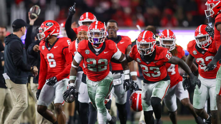 Nov 11, 2023; Athens, Georgia, USA; Georgia Bulldogs defensive back Javon Bullard (22) celebrates with teammates after an interception against the Mississippi Rebels in the second quarter at Sanford Stadium. Mandatory Credit: Brett Davis-USA TODAY Sports
