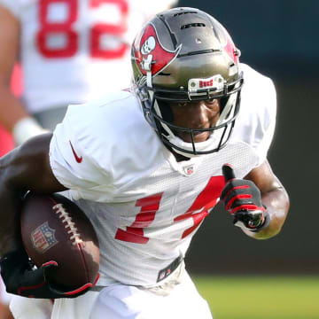 Aug 17, 2020; Tampa, Florida, USA; Tampa Bay Buccaneers wide receiver Chris Godwin (14) trains at AdventHealth Training Center. Mandatory Credit: Kim Klement-USA TODAY Sports