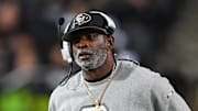 Oct 26, 2024; Boulder, Colorado, USA; Colorado Buffaloes head coach Deion Sanders walks the sidelines in the second half against the Cincinnati Bearcats at Folsom Field. Mandatory Credit: Ron Chenoy-Imagn Images