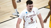 Florida State center Balsa Koprivica (5) celebrates after dunking the ball during their game against UNC Greensboro in the first round of the 2021 NCAA Tournament on Saturday, March 20, 2021, at Bankers Life Fieldhouse in Indianapolis, Ind. Mandatory Credit: Albert Cesare/IndyStar via USA TODAY Sports