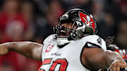 Jan 16, 2023; Tampa, Florida, USA; Tampa Bay Buccaneers defensive tackle Vita Vea (50) reacts after making a sack on Dallas Cowboys quarterback Dak Prescott (not pictured) in the first half during the wild card game at Raymond James Stadium. Mandatory Credit: Nathan Ray Seebeck-Imagn Images