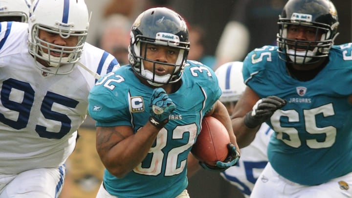 Jacksonville Jaguars running back Maurice Jones-Drew (32) runs for 56 yards as he breaks the team's single season rushing yard record just over 5 minutes into the third quarter against the Indianapolis Colts on January 1, 2012. It was also the final game for the former owners of the Jaguars Wayne Weaver and Delores Barr Weaver. [Kelly Jordan/Florida Times-Union]

Spt 04jagscoltskj010