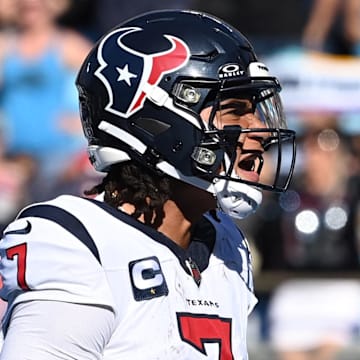 Oct 29, 2023; Charlotte, North Carolina, USA; Houston Texans quarterback C.J. Stroud (7) reacts after scoring a touchdown in the third quarter at Bank of America Stadium. Mandatory Credit: Bob Donnan-Imagn Images